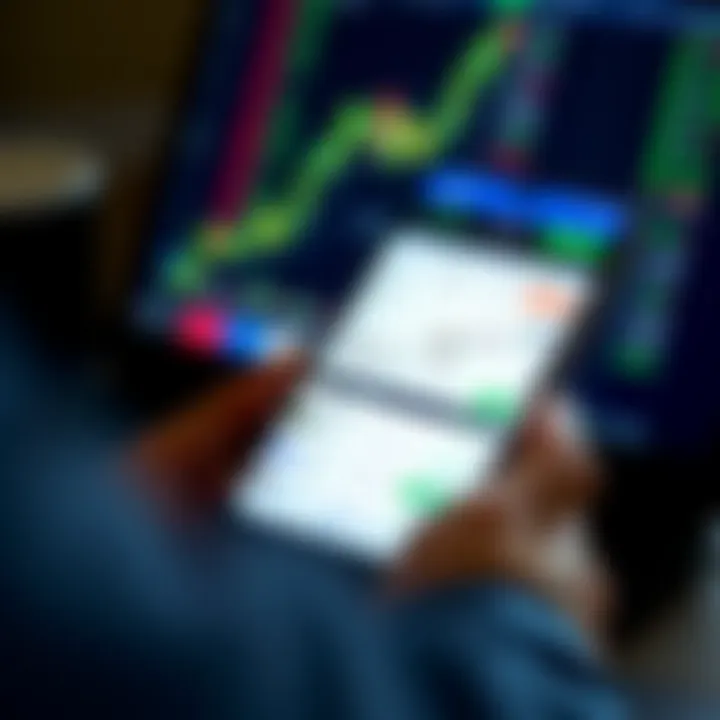 Mobile phone displaying a share trading app interface with stock charts and financial data